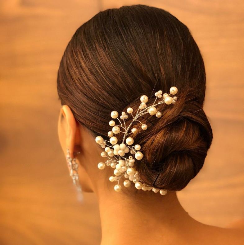 Amp up the classic twist with hair accessories