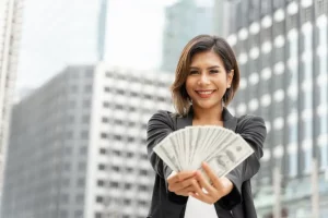 successful-beautiful-asian-business-woman-holding-money-us-dollar-bills-hand-business-concept