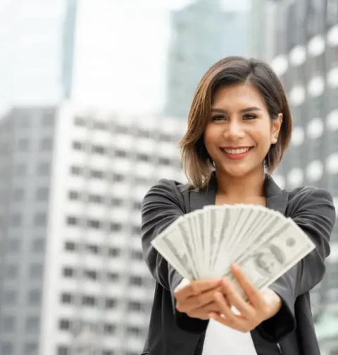 successful-beautiful-asian-business-woman-holding-money-us-dollar-bills-hand-business-concept