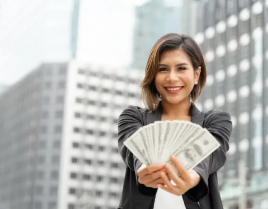 successful-beautiful-asian-business-woman-holding-money-us-dollar-bills-hand-business-concept