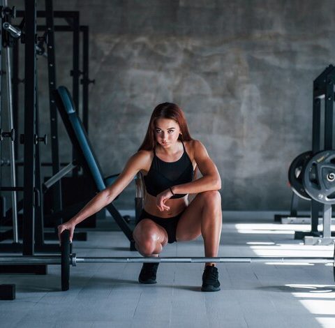 young-fitness-woman-with-slim-type-body-black-sportive-clothes-is-gym